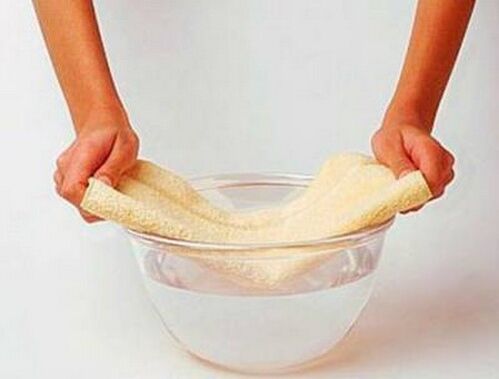 Compress with a towel soaked in warm water - prepare the penis for exercise
